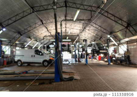 Blurred background image with cars in automobile repair service 111338916