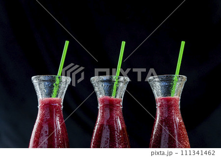 Smoothies with Beetroot, blueberries and mint in glass jar with fruits and vegetables on the wooden table. Detox, diet, healthy, vegetarian drink concept 111341462