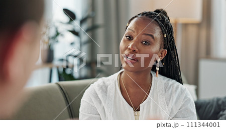 Psychology, mental health and empathy with a black woman therapist talking to a patient in her office. Support, consulting and trauma with a young psychologist listening to a client in grief therapy Psychology, mental health and empathy with a black woman therapist talking to a patient in her office. Support, consulting and trauma with a young psychologist listening to a client in grief therapy 111344001
