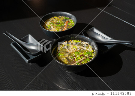 Fish Broth with Greens, Sesame Seeds and Herbs Fish Broth with Greens, Sesame Seeds and Herbs 111345395