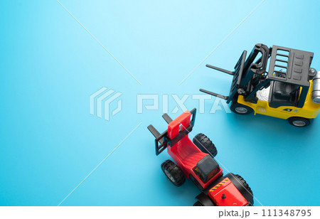 Fork loaders. Warehouses, manufacturing facilities, and distribution centers. Inventory accuracy. Supply chain optimization. Efficient logistics and distribution systems. Fork loaders. Warehouses, manufacturing facilities, and distribution centers. Inventory accuracy. Supply chain optimization. Efficient logistics and distribution systems. 111348795