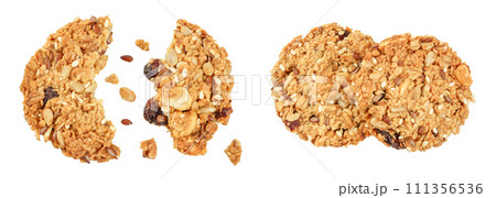 Granola cookie isolated on white background with full depth of field. Top view. Flat lay. Granola cookie isolated on white background with full depth of field. Top view. Flat lay. 111356536