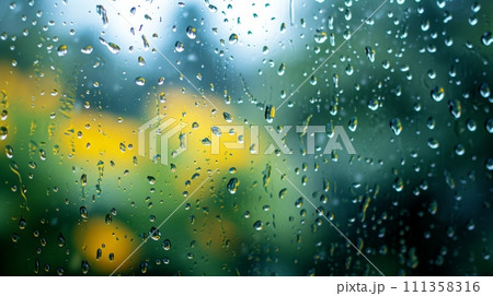 Glistening raindrops on windowpanes create a soothing, minimalist spring setting 111358316