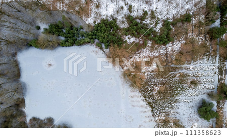 Snow's Retreat: Aerial View of a Thawing Landscape 111358623