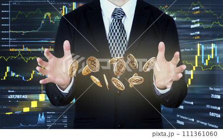 Bitcoins falling in to Businessmans hands. Cryptocurrency and banking 111361060