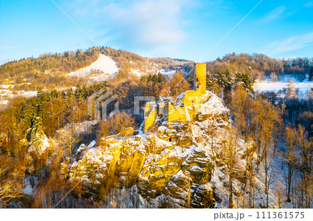 Frydstejn medieval castle ruins at cold morning sunrise time. Bohemian Paradise, Czech: Cesky raj, Czechia. Aerial view from above. 111361575
