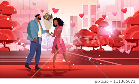 man giving bouquet of flowers to beautiful woman happy valentines day celebration concept air balloons in heart shape cityscape background 111365073