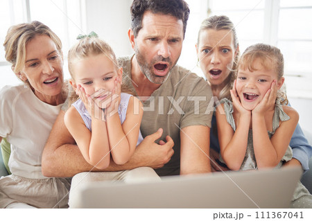 Family wow, streaming movie and kids with surprise at online email, shock at horror film on subscription service and notification on web on laptop. Parents and grandmother scared of news on tech 111367041