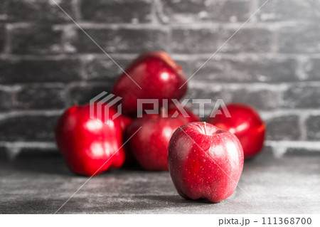 red apples on wooden background red apples on wooden background 111368700