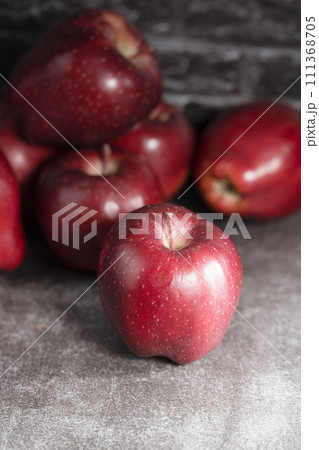 red apples on wooden background 111368705