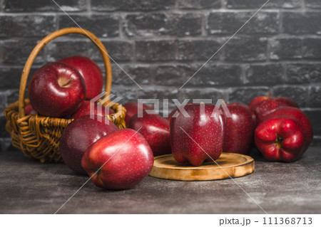 red apples on wooden background 111368713