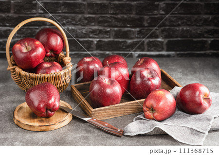 red apples on wooden background 111368715