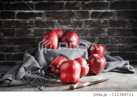 red apples on wooden background 111368721