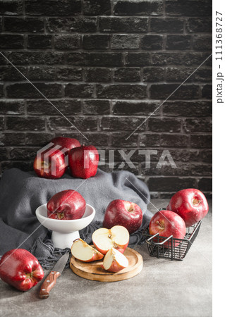 red apples on wooden background 111368727