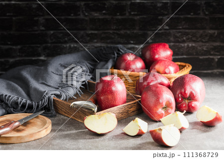 red apples on wooden background red apples on wooden background 111368729
