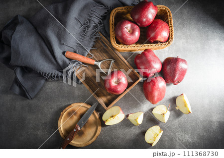 red apples on wooden background red apples on wooden background 111368730