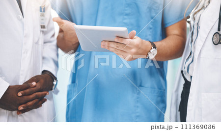 Teamwork, healthcare and doctors planning on digital tablet, sharing advice and checking online schedule in a hospital. Communication, strategy and innovation closeup of health experts sharing vision Teamwork, healthcare and doctors planning on digital tablet, sharing advice and checking online schedule in a hospital. Communication, strategy and innovation closeup of health experts sharing vision 111369086