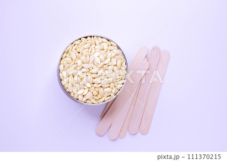 Shugaring. Young woman skin care. Spa, laser epilation, depilation. 111370215