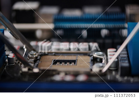 Extreme closeup of CPU installed inside of disassembled computer, copy space 111372053