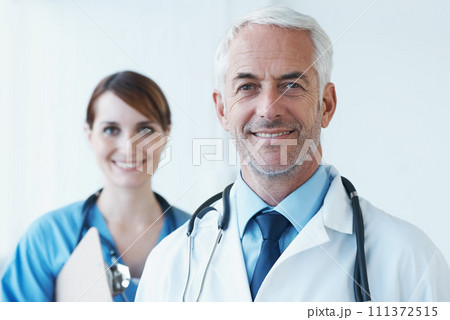 Smile, portrait and doctor with nurse in hospital with clipboard for medical research in collaboration. Happy, checklist and senior male surgeon with healthcare worker in clinic for teamwork. Smile, portrait and doctor with nurse in hospital with clipboard for medical research in collaboration. Happy, checklist and senior male surgeon with healthcare worker in clinic for teamwork. 111372515
