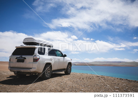 Tibet,China - April 07,2023 ,Driving Toyota off road car on the high altitude mountains 111373591