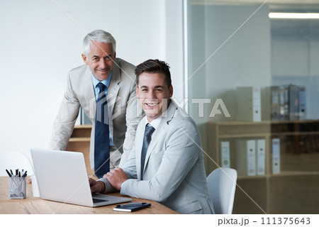 Boss, businessman and coworker with laptop, plan and work for expanding in office and accounts. Executive, employer and accountant at desk, company and meeting for management and staff administration 111375643