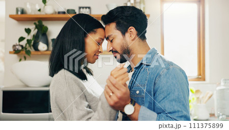 Couple, dancing and kitchen with love for bonding and quality time in home. Romance, marriage and man or woman with movement for care with calm to celebrate happy relationship for partnership. 111375899
