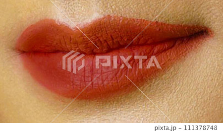 Beautiful Young Woman Healthy Lips. Female lips with vibrant lipstick color. Lip Care And Beauty Beautiful Young Woman Healthy Lips. Female lips with vibrant lipstick color. Lip Care And Beauty 111378748