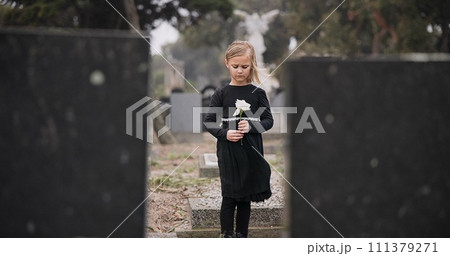 Sad, death or kid in cemetery for funeral. spiritual service or grave visit for respect in Christian religion. Mourning, tomb or depressed girl child outside in graveyard for grief, loss or farewell Sad, death or kid in cemetery for funeral. spiritual service or grave visit for respect in Christian religion. Mourning, tomb or depressed girl child outside in graveyard for grief, loss or farewell 111379271