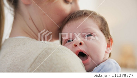 Baby, yawn and calm with tired newborn and mom in a bedroom at morning with care. Rest, relax and young kid with fatigue and mother support in a family home with motherhood in house with bonding Baby, yawn and calm with tired newborn and mom in a bedroom at morning with care. Rest, relax and young kid with fatigue and mother support in a family home with motherhood in house with bonding 111379577