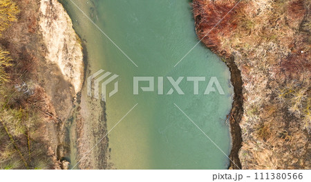 River meander winter floodplain delta Zastudanci drone aerial inland video shot in sandy sand alluvium freezing cold national nature reserve, benches forest and lowlands wetland swamp, view flying fly River meander winter floodplain delta Zastudanci drone aerial inland video shot in sandy sand alluvium freezing cold national nature reserve, benches forest and lowlands wetland swamp, view flying fly 111380566