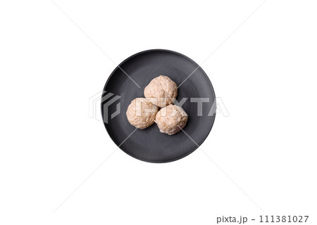 Delicious healthy steamed chicken cutlets or minced meatballs 111381027