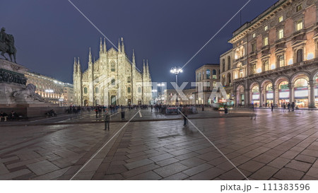 Panorama showing Milan Cathedral and Vittorio Emanuele gallery day to night timelapse. 111383596