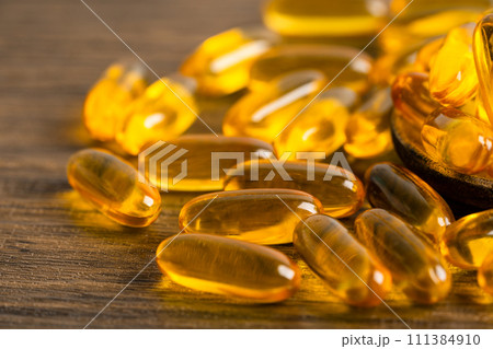 Fish oil Omega 3 capsules vitamin with EPA and DHA isolated on white background. 111384910