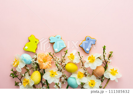 Spring flowers and Easter eggs and bunnies 111385632