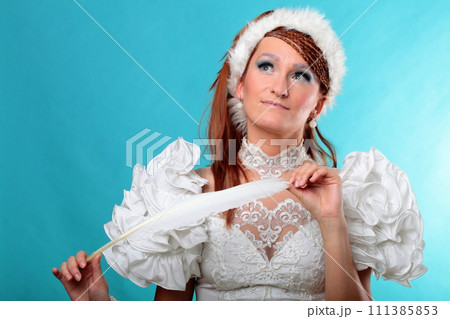 Beautiful ginger in a dress of Snow Queen 111385853