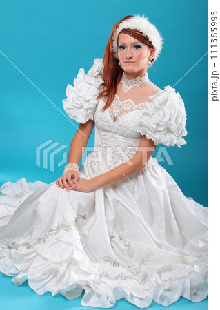 Beautiful ginger in a dress of Snow Queen 111385995