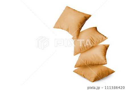 Stack of orange pillows isolated on white background Stack of orange pillows isolated on white background 111386420