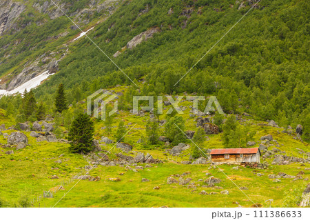 Old wooden cabin in forest Norway Old wooden cabin in forest Norway 111386633