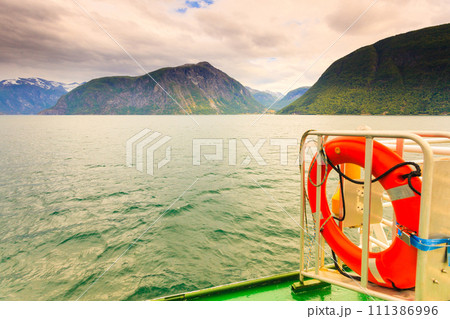 ship ferryboat on norwegian fjord 111386996