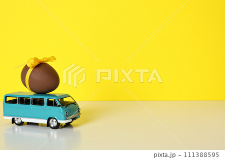 A toy car with a chocolate egg 111388595