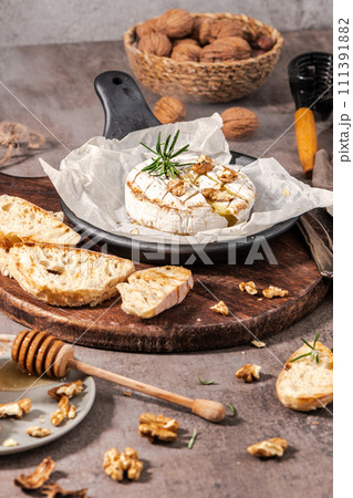Fresh sliced Camembert cheese 111391882