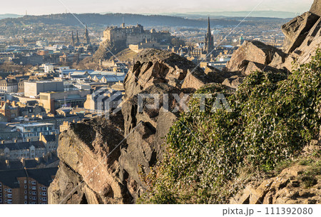 Amazing Edinburgh Cityscape seen from the top of Salisbury Crags. Amazing Edinburgh Cityscape seen from the top of Salisbury Crags. 111392080