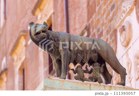Bronze sculpture of the Capitoline she-wolf feeding children. 111393057