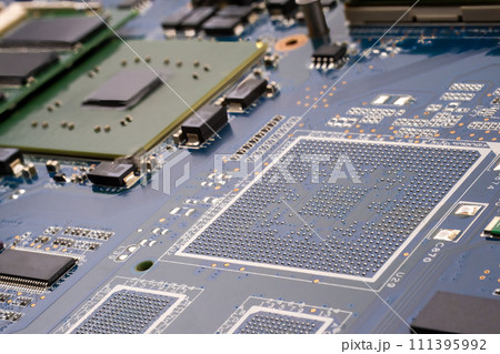 Concept cyber security. A detailed shot of a computer motherboard, featuring a CPU, chipsets and circuit board showcasing the intricate engineering and composite materials used in its manufacturing Concept cyber security. A detailed shot of a computer motherboard, featuring a CPU, chipsets and circuit board showcasing the intricate engineering and composite materials used in its manufacturing 111395992