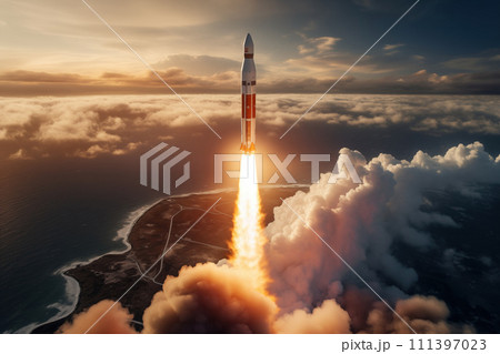 Aerial view of rocket launch at sunrise over ocean coast 111397023