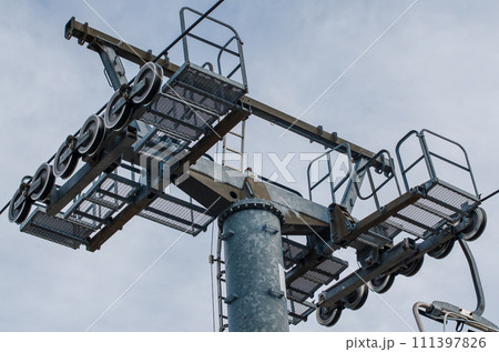 Mast of a chairlift 111397826