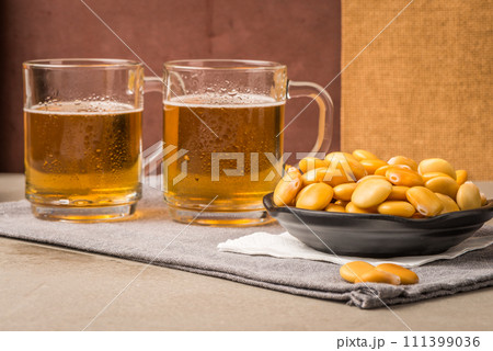 Tasty lupins and glass of beer 111399036