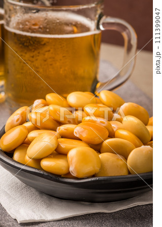Tasty lupins and glass of beer 111399047