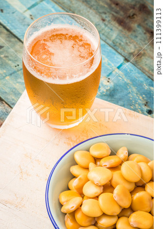 Tasty lupins and glass of beer Tasty lupins and glass of beer 111399113